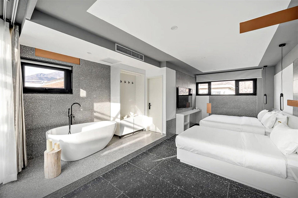 現(xiàn)代輕奢風農家院改造民宿裝修設計案例(圖7)